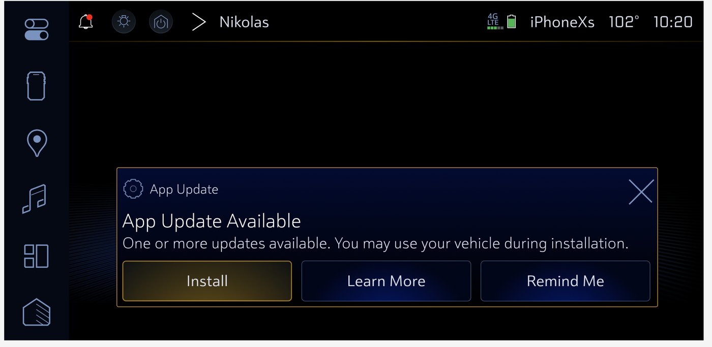 In-vehicle screen: App Update Available. One or more updates available. You may use your vehicle during installation. Buttons for Install, Learn More, and Remind Me.