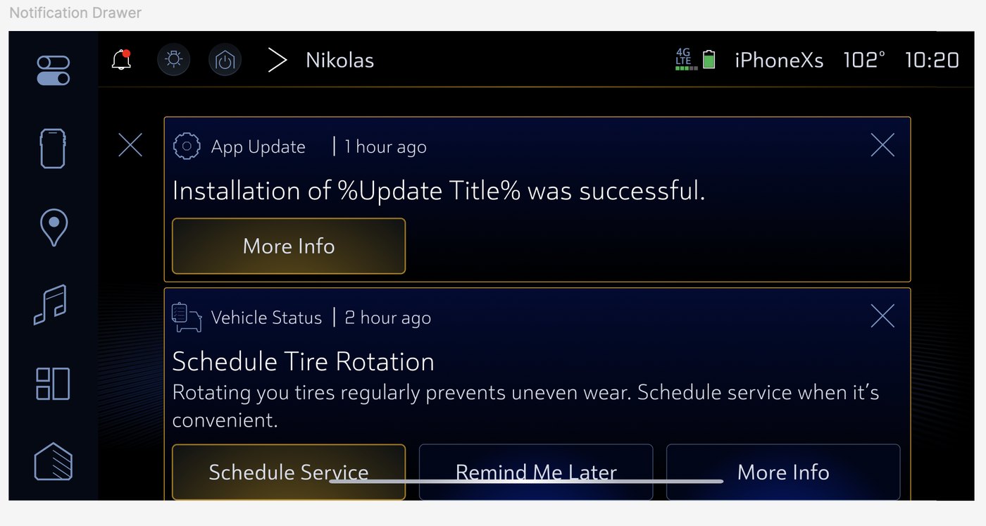 Notification drawer showing the successful app update notification alongside a vehicle status notification about scheduling a tire rotation.